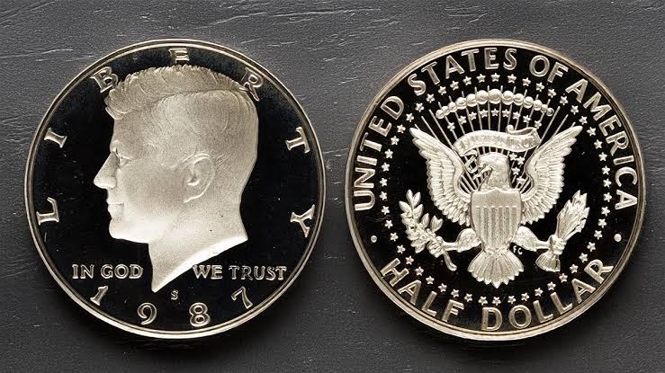 Group of 1987 Kennedy half dollars showing typical surface quality and survival condition spectrum